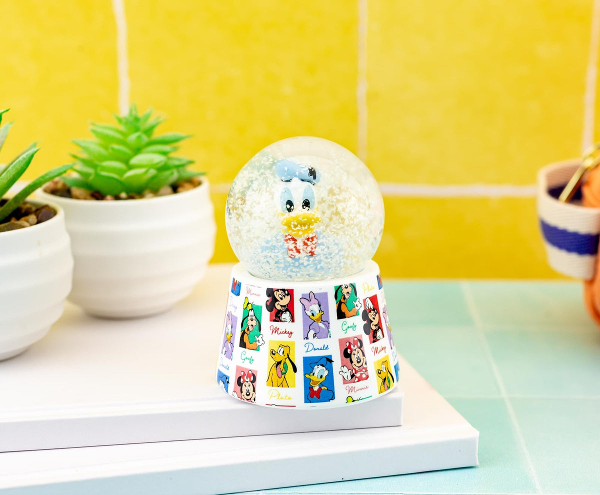 Disney Donald Duck 3-Inch Mini Light-Up Snow Globe