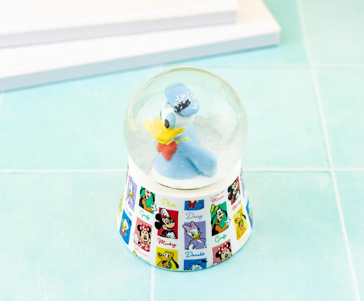 Disney Donald Duck 3-Inch Mini Light-Up Snow Globe